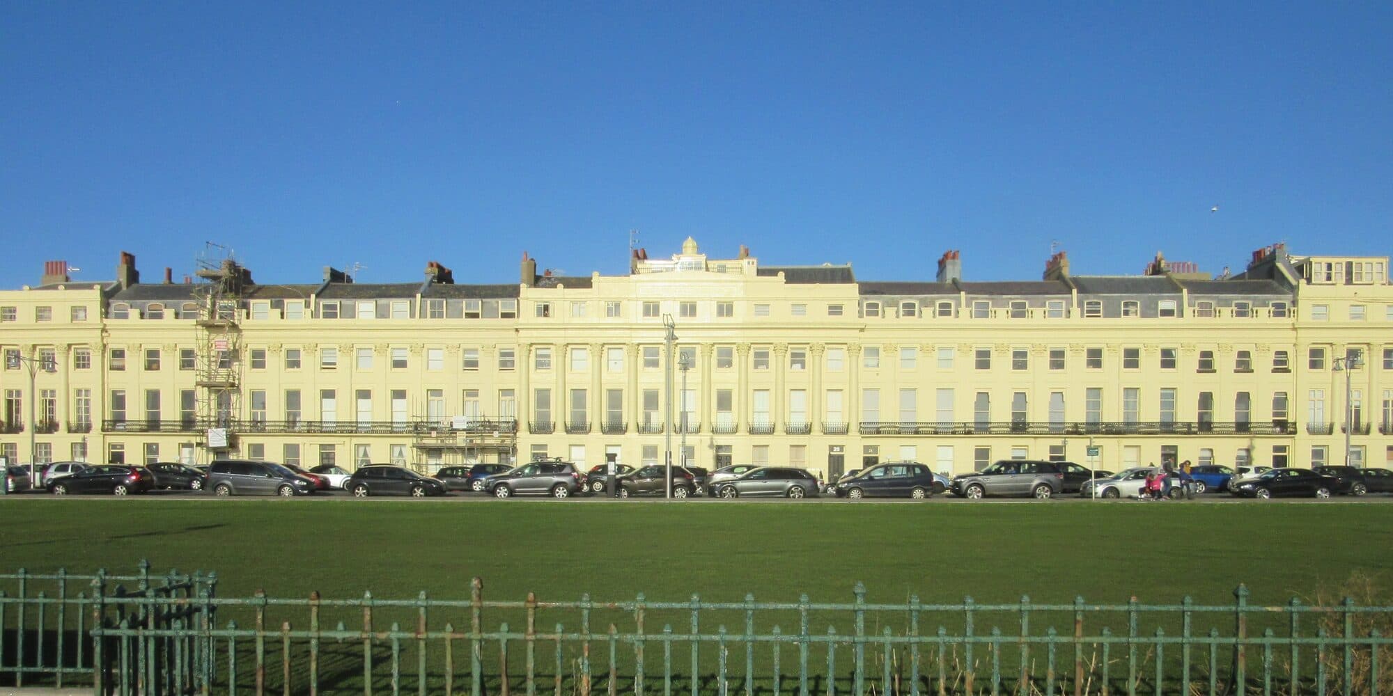 Brunswick Terrace, Hove: a long cream Regency terrace facing the seafront lawns
