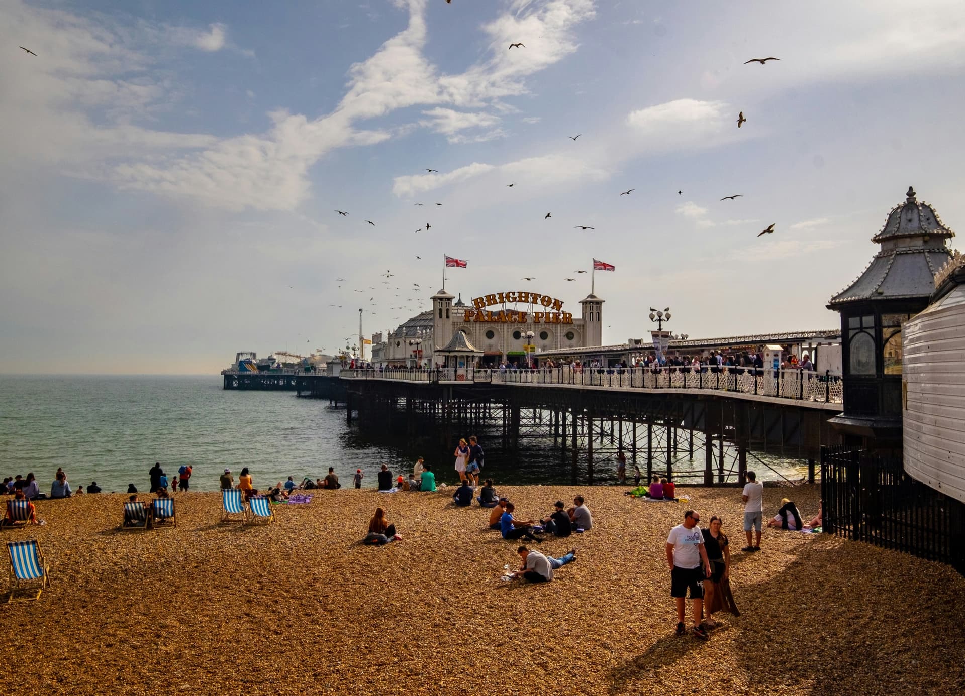 Brighton beach and Palace Pier on a bright day