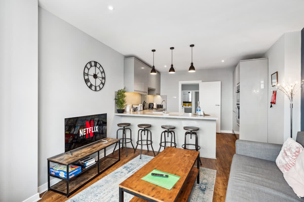Open-plan living and dining space of the ten-guest South House group stay in central Brighton