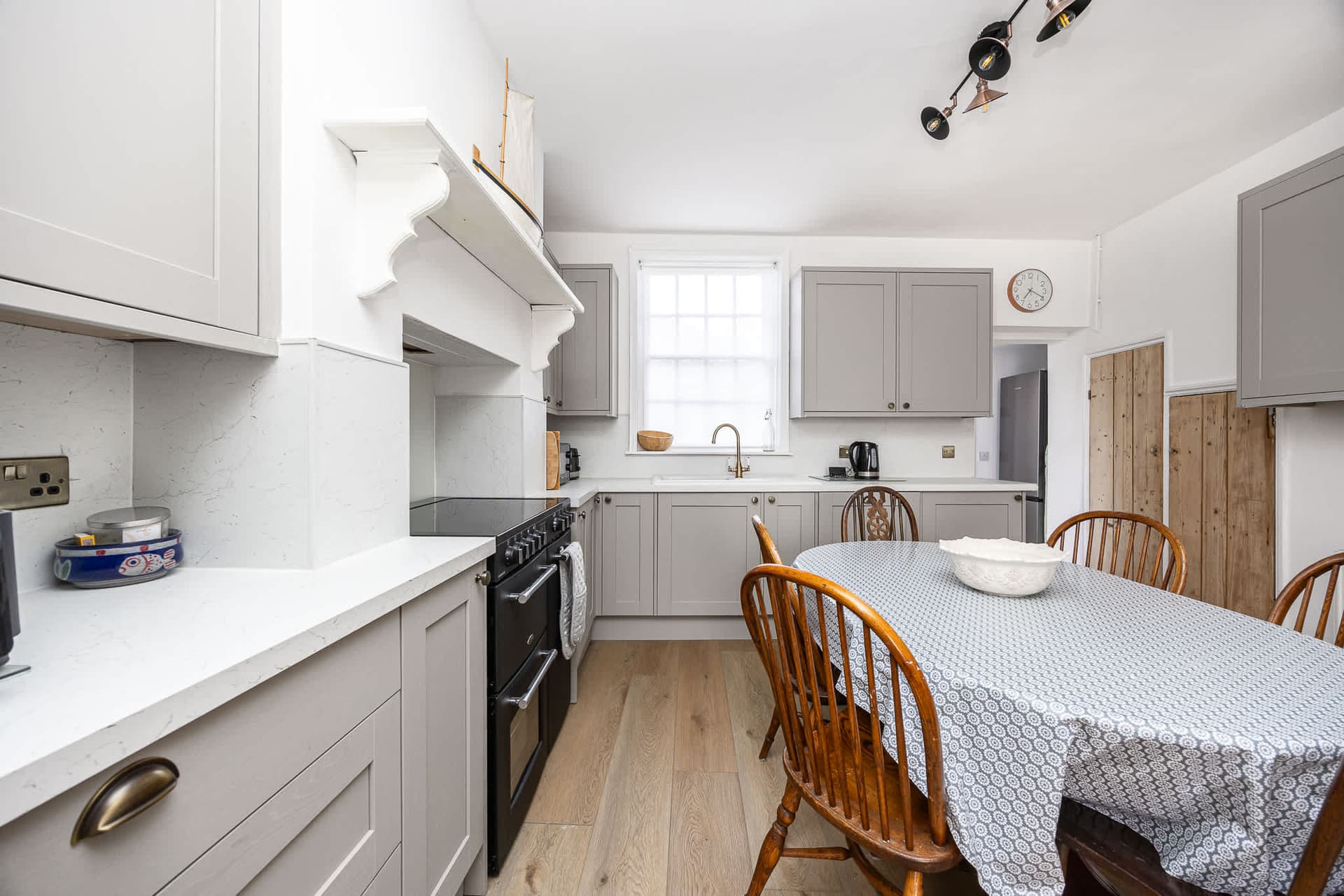 Well-proportioned kitchen with classic detailing in a South House-managed home